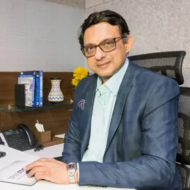 Dr. Chandresh expert dentist at DentiCare India